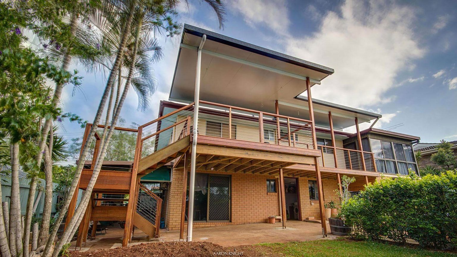 Insulated flyover Patio Roofing with Deck Brisbane - DeKing Decks