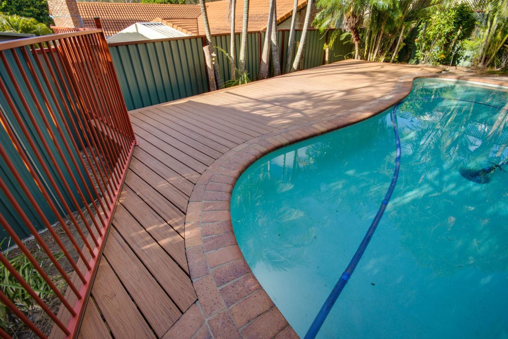 https://www.dekingdecks.com.au/pros-and-cons-of-eco-friendly-decking/ Carindale Composite Pool Deck Deking Decks Composite vs Hardwood Decking