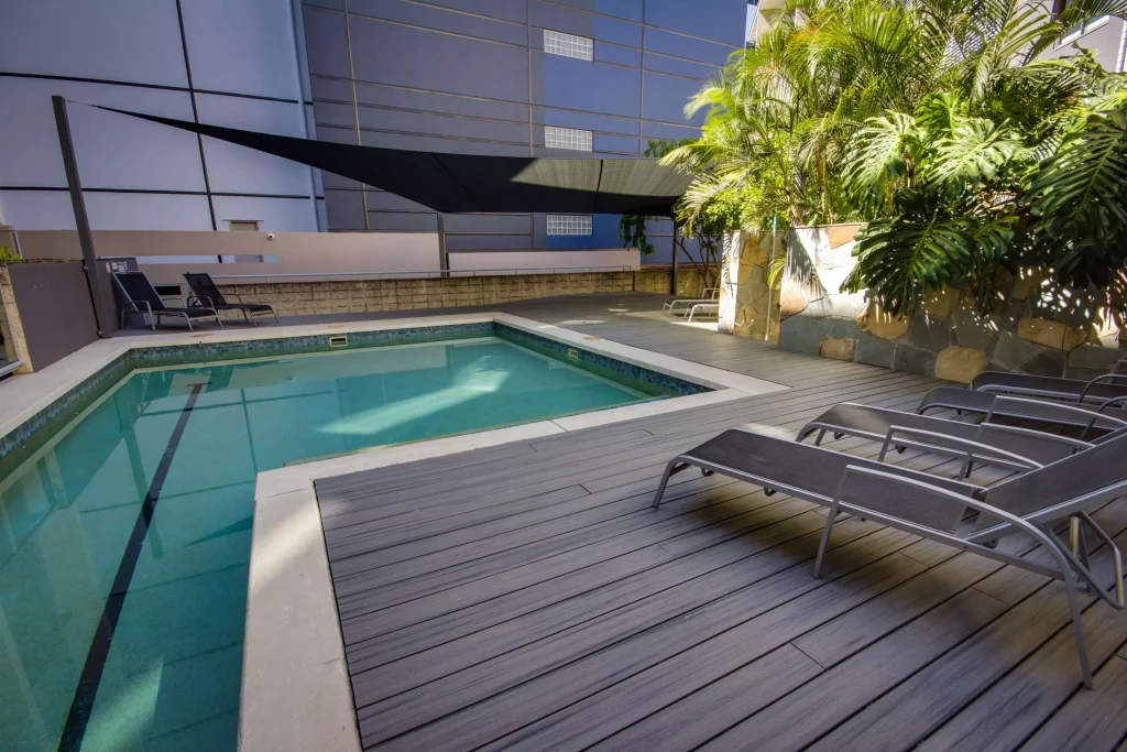 Sustainable eco decking composite decking around a pool in brisbane